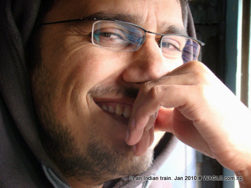 dinesh wagle, nepali journalis, traveling in an indian train