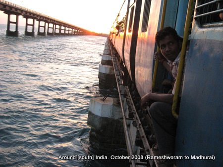 a train and a bridge over sea near rameswaram