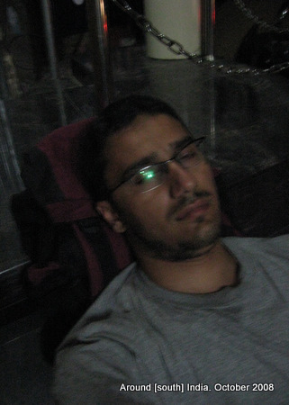 dinesh wagle takes a nap on the street just outside a hotel in rameswaram