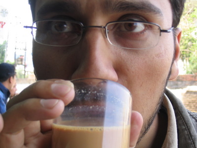 dinesh wagle sipping tea