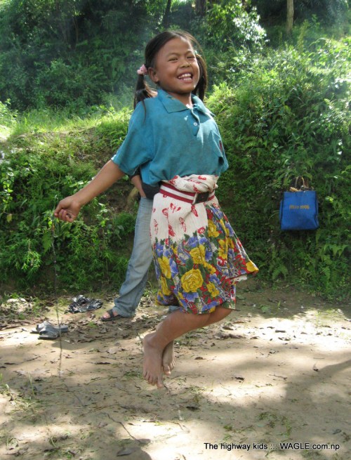 highway kids of nepal. playing skipping