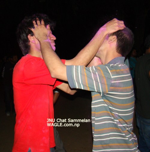 holi the festival of colours. putting colors on each other