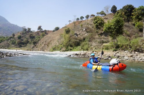 Day 2: Continuously four hours into Indrawati river. I was a bit nervous in the beginning. There was a mild rapid withing 100 meters from our starting point. Could I pass through that hurdle? I did. What about many more that may lie ahead? It turned out to be the most challenging rapid in the whole duration. We met and saw many kids in and by the river who were swimming, fishing, playing and returning home from their schools. Some tried to chase us in river. By the time we reached Dolalghat I was very tired. My arms were aching. I was hungry. But the river was easy, I was in control of my boat, I maneuvered well and took the boat wherever I wanted. There were some scary moments but I handled them well. At Dolalghat, I got off the boat as a confident rafter. Fish and Sprite at Dolalghat. Then into a bus for Jalbire. When too many people came into the bus we decided to go at the top.