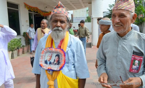 "King" and "Queen" in their hearts. The man on the left, resident of Dhanusha district of which Janakpur is headquarter, camped at the hotel for two days to get a glimpse of the ex-king. Yesterday he wore daura suruwal.