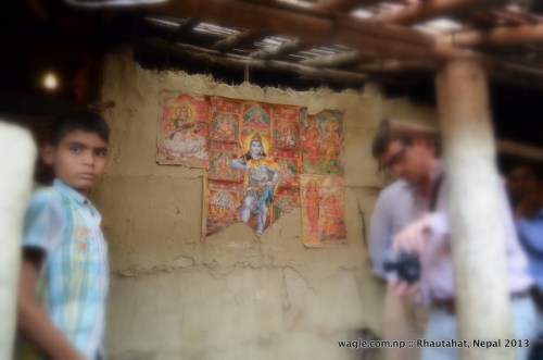 Religious posters pasted on the wall of a house owned by a Dalit in Pipariya Dostiya village of Rhautahat district.