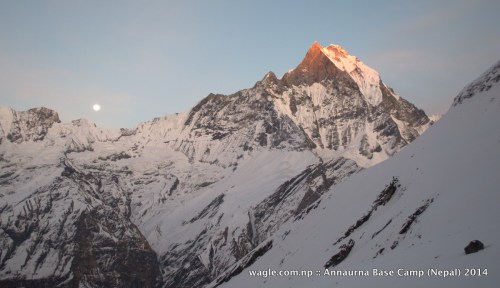 Moon rose from the east as the last rays of the sun hit the summit of Mt Machhapuchhre