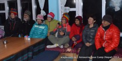 Chinese and Indian tourists posed for a group photo inside the dining hall of a lodge at the Annapurna Base Camp