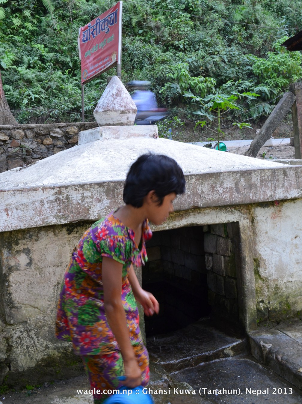 A girl and a well