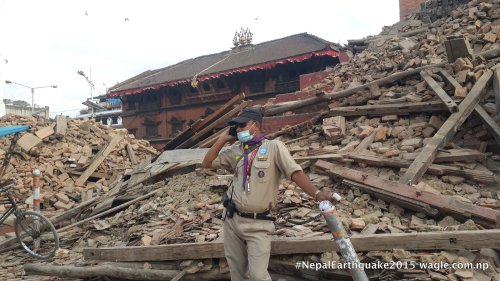 Ruins of the Trailokya Mohan Temple. Kumari House which survived the quake, in the background.