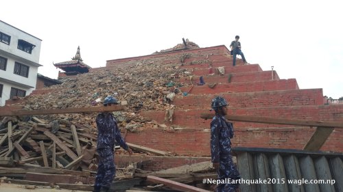A day after the #NepalEarthquake, policemen were clearing the rubble and retrieving invaluable woodcarvings from the fallen Maju Deval Temple in Kathmandu Darbar Square.