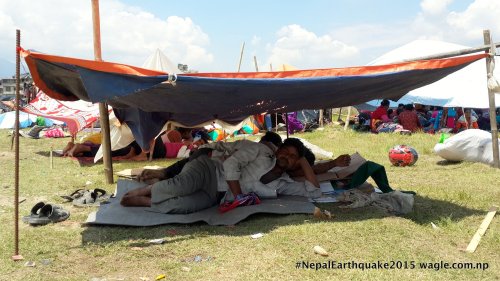 Men from the plains; arrived in Kathmandu to work; now under a tent like everyone else.