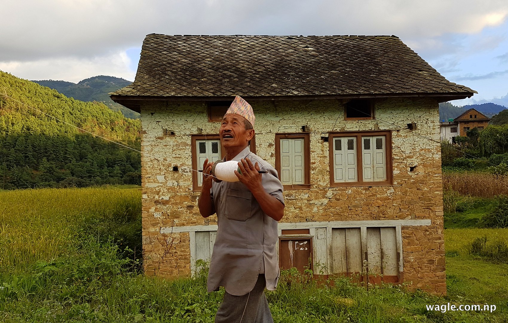Man flies kite in Narayanhitti, Chitlang village