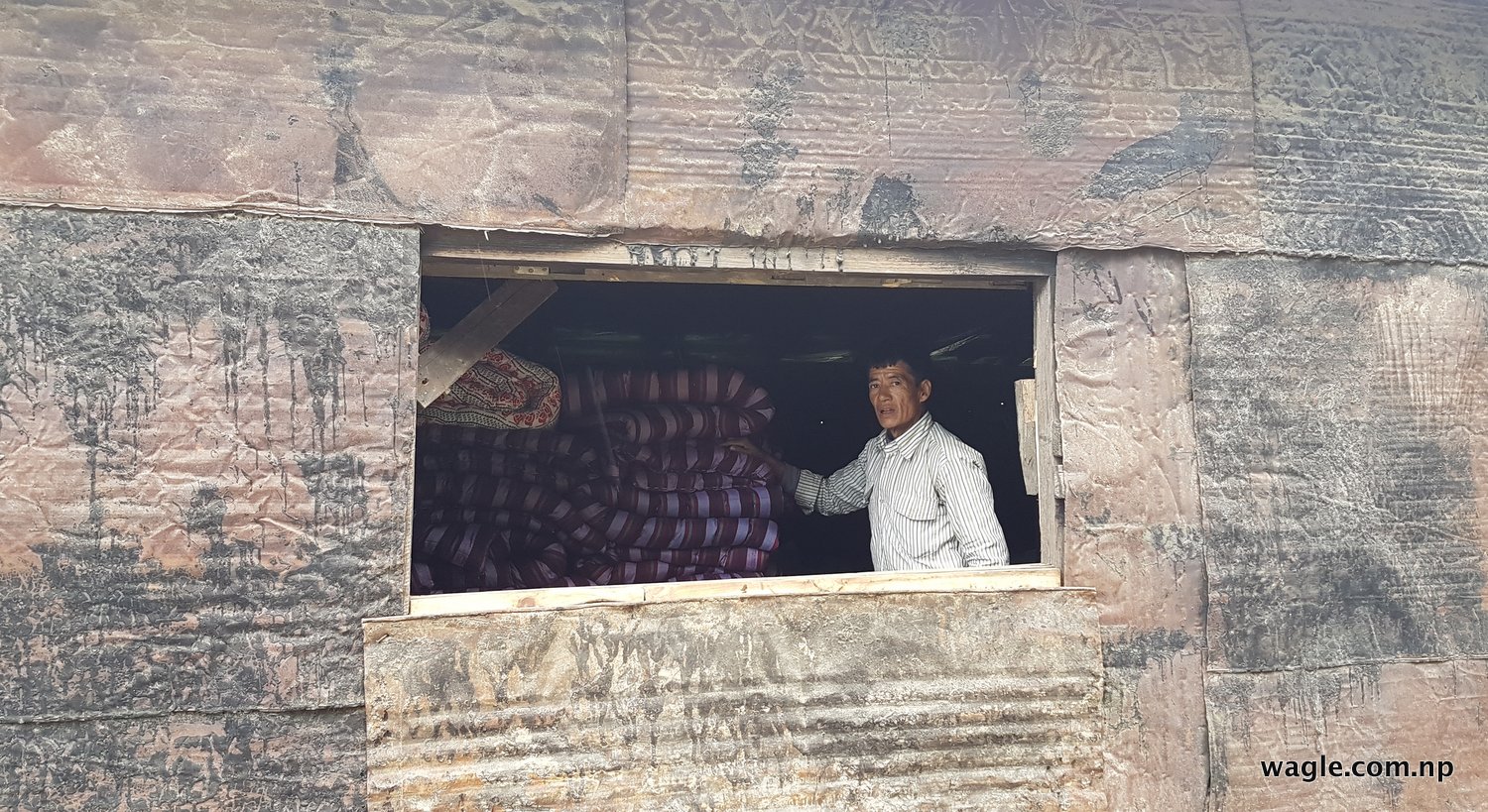 A bedding seller in Tistung Deurali village.